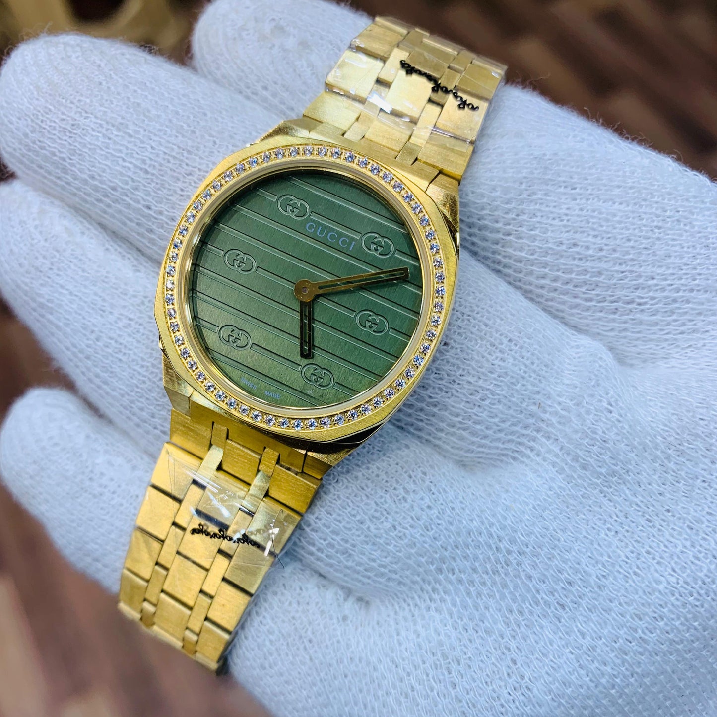 Gucci Women Green Dial Stone Bezel With Gold Bracelet